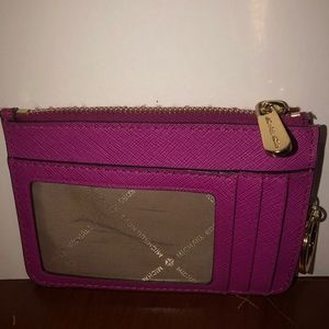 Pink MK coin/ID purse.